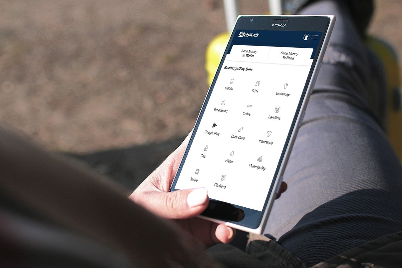 person using a mobile wallet app