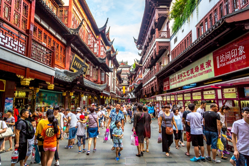 Shanghai, China - July 21st. 2016 - Local and tourists enjoying a warm summer day in downtown Shanghai in China, Asia.