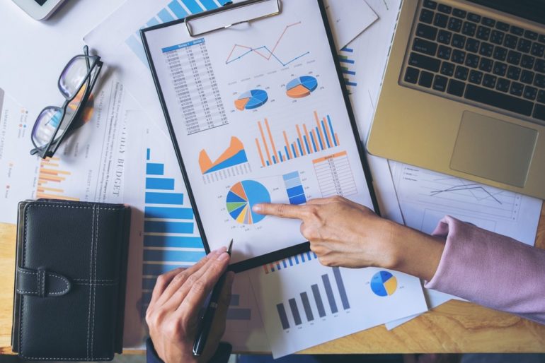 Data charts on a piece of paper