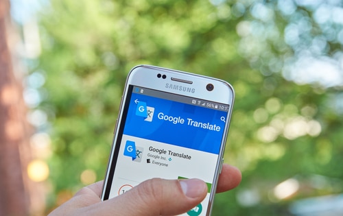 Smartphone with Google Translate app open on it