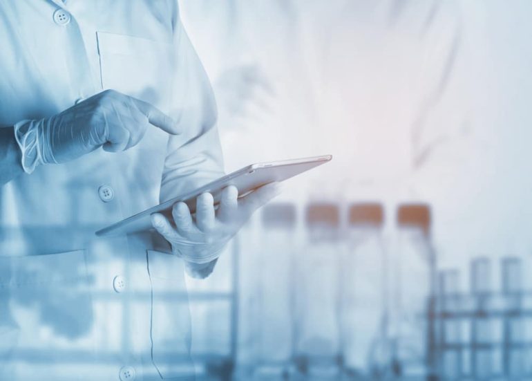 scientist using tablet in the laboratory,Laboratory research concept,science background